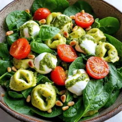 - 12 oz fresh cheese tortellini - 1 cup cherry tomatoes, halved - 1 cup fresh mozzarella pearls - 2 cups baby spinach - ½ cup basil pesto - ½ cup Greek yogurt - 1 tablespoon olive oil - Salt and pepper to taste - Optional: ¼ cup pine nuts, toasted - Optional: Fresh basil leaves for garnish When making this creamy pesto tortellini salad, you need fresh cheese tortellini as the base. You can find this at most grocery stores. The tortellini gives a nice bite and pairs well with other fresh ingredients. Next, you will want cherry tomatoes. Their sweet and juicy flavor adds brightness to the dish. Fresh mozzarella pearls make it creamy and fun. Baby spinach adds color and nutrition. For the creamy dressing, you will use basil pesto and Greek yogurt. This combo gives rich taste without being too heavy. Don’t forget the optional ingredients! A drizzle of olive oil enhances the flavor. You can add salt and pepper to taste. If you like a bit of crunch, toasted pine nuts are a great choice. Fresh basil leaves can make your salad look beautiful and add a burst of flavor. For the full recipe and details, check [Full Recipe]. - Bring a large pot of salted water to a boil. - Cook tortellini according to package instructions (3-4 minutes). - Drain and rinse under cold water. Cooking tortellini is quick and easy. Start by boiling salted water in a large pot. The salt adds flavor to the pasta. Once the water is bubbling, add the tortellini. Cook them for about 3 to 4 minutes. They should be tender but still firm. After cooking, drain them in a colander. Rinse the tortellini under cold water. This stops the cooking and cools them down fast. - Blend basil pesto with Greek yogurt until smooth. - Combine dressing with cooled tortellini. For the dressing, mix basil pesto with Greek yogurt. Use a whisk or spoon to blend until smooth. This mix gives a creamy texture and rich flavor. Once the dressing is ready, fold it into the cooled tortellini. This coats the pasta evenly and adds a burst of flavor. - Add cherry tomatoes, mozzarella pearls, and baby spinach. - Drizzle with olive oil and season with salt and pepper. - Gently toss to coat evenly. Now, it's time to add more tasty ingredients. Toss in halved cherry tomatoes, fresh mozzarella pearls, and baby spinach. These add color and crunch to the dish. Drizzle a little olive oil over the salad. Season it with salt and pepper to taste. Then, gently mix everything together. This ensures each bite is flavorful and fresh. For the complete recipe, check the Full Recipe. You can switch up the pesto for different flavors. Try sun-dried tomato pesto or spinach pesto. Both add a unique twist to the dish. For pasta, if you don’t have tortellini, use shapes like farfalle or rotini. These options still work well with the creamy dressing. Present your salad in a bright bowl to make it pop. A colorful serving bowl adds visual appeal. You can also plate it individually for a nice touch. For added protein, pair the salad with grilled chicken or shrimp. This makes the meal more filling and satisfying. To boost the taste, add fresh herbs like parsley or basil. You can also sprinkle some red pepper flakes for a bit of heat. Chilling the salad is key for flavor. Let it sit in the fridge for at least 30 minutes. This helps the flavors blend and enhances the overall taste. For the full recipe, check out the complete guide. {{image_4}} Adding your favorite ingredients can make the creamy pesto tortellini salad even better. Here are some great ideas. - Roasted bell peppers: These add a sweet taste and nice color. - Artichoke hearts: They bring a unique flavor and texture to the dish. These veggies not only boost taste but also add more nutrients. You can roast the bell peppers in the oven or grill them for extra flavor. - Adding chicken or shrimp: Cooked chicken or shrimp can make this salad heartier. - Vegetarian options like chickpeas: Chickpeas add protein while keeping it meat-free. Simply toss in your protein choice after mixing the salad. This keeps prep simple and quick. - Gluten-free pasta options: Use gluten-free tortellini for those avoiding gluten. - Vegan alternatives (tofu, vegan pesto): Swap Greek yogurt with tofu and use vegan pesto. These changes help you enjoy this dish, no matter your diet. You can find gluten-free and vegan ingredients at most grocery stores. Feel free to explore these variations and create your perfect version of this creamy pesto tortellini salad. For the full recipe, check out the earlier section. To keep your creamy pesto tortellini salad fresh, store it in an airtight container. This method keeps the flavors intact and prevents moisture loss. It will stay fresh in the fridge for about three to four days. Remember to check for any signs of spoilage, such as off smells or changes in texture. Freezing this salad is not ideal due to the creamy dressing. However, if you want to freeze it, do the following: first, prepare the tortellini and veggies as usual. Then, store them in a freezer-safe container without the dressing. This helps avoid a watery texture. When ready to enjoy, thaw it overnight in the fridge. For reheating, warm the tortellini gently in a pan, then mix with fresh dressing. When serving chilled, let the salad sit at room temperature for about 15 minutes. This helps enhance the flavors. To refresh the texture, add a drizzle of olive oil or a squeeze of lemon juice. Mixing in some fresh basil or extra pesto can also boost the taste after storage. Enjoy your vibrant salad with a burst of flavor! You can easily prepare this salad ahead of time. Cook the tortellini and cool it completely. Mix the dressing with the tortellini and other ingredients. Cover the bowl and store it in the fridge. This way, the salad will stay fresh for up to three days. Just give it a gentle toss before serving to mix everything well. Yes, you can use store-bought pesto. It saves time and still gives great flavor. Look for a good quality pesto that has fresh ingredients. This choice makes your Creamy Pesto Tortellini Salad quick and easy. Serve the salad chilled for the best taste. You can use a large serving bowl or individual plates. Garnish with fresh basil leaves and toasted pine nuts if you like. This adds a nice touch and makes it look inviting. Absolutely! This salad is perfect for meal prep. It keeps well in the fridge, making it a great choice for lunches or quick dinners. Just remember to store it in airtight containers. This way, you can enjoy it throughout the week. For a dairy-free version, you can use cashew cream or coconut yogurt. Both options will keep the creamy texture. You can also try using a dairy-free sour cream. These substitutes work well and make the salad just as delicious. For the full recipe, check out the details above! This blog post explored how to make a tasty Creamy Pesto Tortellini Salad. We covered the main ingredients you need and how to prepare them step-by-step. You learned about serving tips, ingredient swaps, and variations to suit your taste. Remember to store leftovers well for future meals. Enjoying this salad can bring fresh flavor to your table. Try different add-ins or proteins to keep it exciting each time. Embrace your creativity, and enjoy every bite!