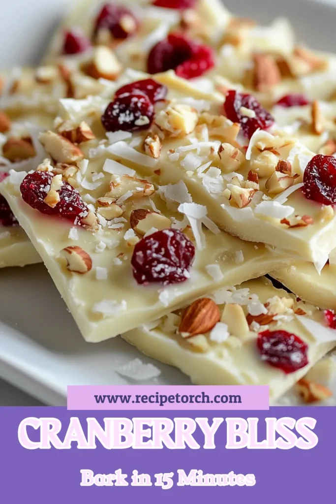 Indulge in the festive spirit with this easy white chocolate cranberry bark recipe! Our white chocolate cranberry bark combines creamy white chocolate, tart cranberries, and crunchy nuts for a delightful holiday treat. Perfect for gifting or enjoying yourself, this simple recipe creates a delicious white chocolate dessert that's sure to impress. Discover how to make this easy chocolate bark today and add it to your holiday favorites! #WhiteChocolateCranberryBark #HolidayBarkRecipe #ChocolateBark #CranberryBlissBark