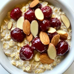 To make Cherry Almond Overnight Oats, you will need: - 1 cup rolled oats - 2 cups almond milk (or any milk of your choice) - 1/2 cup pitted cherries, chopped (can be fresh or frozen) - 1/4 cup almond butter - 2 tablespoons chia seeds - 1 tablespoon maple syrup (optional, for added sweetness) - 1/2 teaspoon vanilla extract - A pinch of salt - Sliced almonds for garnish Each ingredient plays a key role in the recipe. Here are the measurements: - Rolled oats: Use 1 cup to get that perfect base. - Almond milk: 2 cups keep the oats creamy and moist. - Cherries: 1/2 cup adds a burst of tartness. - Almond butter: 1/4 cup makes it smooth and rich. - Chia seeds: 2 tablespoons help thicken the mix. - Maple syrup: Use 1 tablespoon if you like it sweeter. - Vanilla extract: 1/2 teaspoon adds a lovely aroma. - Salt: A pinch balances the flavors. - Sliced almonds: Use for a crunchy topping. If you need alternatives, here are some ideas: - Milk: Replace almond milk with oat, soy, or coconut milk. - Cherries: Any berry or diced apple works well. - Almond butter: Try peanut or cashew butter for a different taste. - Chia seeds: Flax seeds can be a good substitute. - Maple syrup: Honey or agave syrup can also sweeten your oats. These options help you customize the recipe for your needs. Enjoy the process of making this creamy breakfast delight! {{ingredient_image_2}} Start by gathering your ingredients. You will need rolled oats, chia seeds, and a pinch of salt. In a large mixing bowl, add these dry items. Mix them well to combine. Next, take another bowl. Whisk together the almond milk, almond butter, maple syrup, and vanilla extract. Make sure the mixture is smooth. This step is key for a creamy texture. Now, pour the wet mixture over the dry oats. Stir well to coat every oat. You don’t want any dry patches. Then, carefully fold in the chopped cherries. This adds sweetness and color. Once mixed, spoon the oat mixture into two jars or containers. Seal them tightly. Place the jars in the refrigerator overnight. This soaking step is crucial. It helps the oats absorb the liquid and soften. If you’re short on time, soak for at least four hours. In the morning, take the jars out. Open them and give the oats a good stir. This ensures everything is well mixed. If you like it sweeter, now is the time to add more maple syrup. To serve, scoop the oats into bowls or keep them in jars. Top with sliced almonds and extra cherries. This adds crunch and flavor. For a fun twist, layer the oats with more cherries and almonds in clear jars. This makes your breakfast look beautiful. Enjoy your Cherry Almond Overnight Oats as a quick and tasty breakfast. To make your overnight oats creamy, use rolled oats. They soak up liquid well. Mix them with chia seeds for extra creaminess. Chia seeds add texture and help thicken the oats. Use almond milk for a rich, nutty flavor. You can also blend your milk with almond butter for a creamier mix. Make sure to stir the mixture well. This ensures even soaking overnight. Sweetness is key to great overnight oats. Start with one tablespoon of maple syrup. If you want it sweeter, you can add more. Taste the mixture before it soaks. This helps you adjust the sweetness to your liking. You can also use fresh fruit for natural sweetness. Chopped cherries will add a sweet burst in every bite. This way, you can enjoy the oats at your own level of sweetness. Choose the right containers for your oats. Glass jars work best. They are easy to clean and don’t hold odors. Look for jars with tight lids to keep oats fresh. You can also use BPA-free plastic containers. Make sure they are airtight. This keeps the oats from drying out. Layer the oats with extra fruit in clear jars to see the beauty of your dish. It makes breakfast look as good as it tastes. Pro Tips Chia Seed Soak Time: Allow the chia seeds to soak for at least 30 minutes in the liquid before mixing for optimal thickness and texture. Sweetness Adjustment: Taste the mixture before refrigerating; you can always add more maple syrup or sweetener later if needed. Fruit Variations: Experiment with different fruits like blueberries or bananas to keep your overnight oats interesting and flavorful. Meal Prep Friendly: Make a larger batch and store individual servings for a quick grab-and-go breakfast throughout the week. {{image_4}} You can switch up the cherries for different fruits. Try strawberries for spring or peaches in summer. Apples and cinnamon work well in fall. In winter, use dried fruits like cranberries or figs. Each fruit adds its own flavor and texture, keeping your breakfast exciting. Almond butter is delicious, but you can use other nut butters too. Peanut butter brings a rich taste. Cashew butter is creamy and mild. If you prefer, you can use sunflower seed butter for a nut-free option. Each nut butter changes the flavor while keeping it creamy. This recipe is already close to vegan. Use almond milk or any plant-based milk. If you want to skip the honey, maple syrup is a great choice. Check the nut butter too, as some brands may add honey. With these swaps, you enjoy a tasty, vegan breakfast. I recommend storing your Cherry Almond Overnight Oats in airtight jars. This keeps them fresh and tasty. Make sure the lids are tight to prevent any odors from the fridge. You can use glass or plastic containers. Keep them in the main part of the fridge, not in the door. This will help maintain a stable temperature. These oats stay good for up to five days in the fridge. After the first day, the oats will soak up more liquid. This makes them creamier and more flavorful. If you notice any changes in smell or texture, it’s best to toss them. Trust your senses! You can enjoy your Cherry Almond Overnight Oats cold, but if you love warm oats, here’s how. Pour the oats into a bowl and add a splash of almond milk. Heat them in the microwave for about 30 seconds. Stir, then heat for another 30 seconds if needed. This way, they stay creamy and delicious. Don't forget to add your favorite toppings again after heating! Yes, you can use rolled oats. Rolled oats soak up liquid well. They also soften nicely overnight. Steel-cut oats take longer to soften. Using rolled oats gives you a creamy texture. This makes them great for overnight oats. To make this recipe gluten-free, use certified gluten-free oats. Most rolled oats are safe, but check the label. Cross-contamination can happen during processing. Almond milk is usually gluten-free, too. Just ensure any added ingredients are also gluten-free. You can add many toppings to enhance your oats. Fresh fruits like bananas or strawberries work well. Nuts like walnuts or pecans add crunch and flavor. Seeds like pumpkin or sunflower seeds add nutrition. A sprinkle of cinnamon gives warmth and spice. Feel free to mix and match for fun! This blog post covered everything you need to make delicious overnight oats. We explored ingredients, from the complete list to optional ones and alternatives. You learned how to prepare and mix, soak, refrigerate, and serve your oats. I shared tips for creamy texture and customizing sweetness. We also discussed fun variations and smart storage tips. Keep experimenting with flavors and textures to find your favorite mix. With these easy steps and ideas, you can enjoy tasty, healthy oats daily.