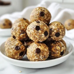 - 1 cup rolled oats - 1/2 cup nut butter (either almond or peanut) - 1/4 cup honey or maple syrup - 1 scoop vanilla protein powder - 1 teaspoon ground cinnamon - 1/4 teaspoon salt - 1/2 cup mini chocolate chips (optional) - 2 tablespoons chia seeds (optional) - 1 teaspoon vanilla extract Each protein ball packs a powerful punch of nutrition. With about 90 calories per ball, you get a good mix of carbs, protein, and healthy fats. Here’s a quick look at the key nutrients: - Protein: Each ball contains around 4 grams of protein, thanks to the protein powder and nut butter. - Fiber: Rolled oats and chia seeds add fiber, aiding digestion and keeping you full longer. - Healthy Fats: Nut butter and chia seeds provide essential fatty acids, supporting heart health. - Rolled Oats: They offer slow-release energy, keeping you energized throughout the day. - Nut Butter: This adds protein and healthy fats. It can help improve heart health and boost brain function. - Honey or Maple Syrup: These natural sweeteners provide quick energy and are less processed than white sugar. - Chia Seeds: High in omega-3 fatty acids, they support your brain and heart health. - Ground Cinnamon: This spice not only adds flavor but helps regulate blood sugar levels, making it a great addition for energy balance. - Vanilla Extract: It enhances taste without extra sugar, making your snack even more delicious. These ingredients work together to create a tasty and healthy snack. Enjoying these protein balls can help you stay on track with your health goals while satisfying your sweet tooth. {{ingredient_image_2}} To make cinnamon vanilla protein balls, gather all your ingredients first. You need rolled oats, nut butter, honey or maple syrup, protein powder, cinnamon, salt, and vanilla extract. Optional ingredients include mini chocolate chips and chia seeds. 1. Combine Ingredients: In a large mixing bowl, put the rolled oats, nut butter, and honey (or maple syrup). 2. Stir Well: Use a spatula to mix these until no dry oats are left. 3. Add Dry Ingredients: Next, sprinkle in the vanilla protein powder, ground cinnamon, and salt. If you use chia seeds, add them now too. 4. Mix Again: Stir until everything is evenly mixed. 5. Add Vanilla Extract: Pour in the vanilla extract and mix until the dough sticks together. 6. Optional Chocolate Chips: If you want mini chocolate chips, fold them in gently. 1. Form Balls: Use clean hands to scoop about one inch of the mixture. Roll it into a ball shape. 2. Place on Sheet: Put the balls on a baking sheet lined with parchment paper. Leave space between them. 3. Chill: Transfer the sheet to the fridge for at least 30 minutes. This makes them firm. 4. Store: After chilling, move the protein balls to an airtight container. Enjoy them as a snack or post-workout treat! To get the best texture for your protein balls, start with the right balance of ingredients. Use rolled oats for a chewy base. The nut butter adds creaminess, while honey or maple syrup provides sweetness and binds everything together. Mix well until no dry oats remain. If the mix feels too crumbly, add a little more nut butter or syrup. If it’s too sticky, add extra oats. This will help you form nice, round balls. One common mistake is not chilling the protein balls long enough. If you skip this step, they may fall apart. Another mistake is adding too many liquid ingredients. Stick to the amounts listed in the recipe. Too much liquid can make your mixture too soft. Lastly, don’t skip the mixing step. You need to blend all ingredients well to ensure equal flavor and texture. To boost flavor without sugar, use fresh vanilla extract. It adds depth and richness. Ground cinnamon is another great choice. It gives warmth and spice without any added sugar. You can also add nuts or seeds for more flavor and crunch. If you want a sweeter taste, consider adding a bit of unsweetened cocoa powder. This will add a nice chocolatey kick without extra sugar. Pro Tips Keep It Fresh: Store your protein balls in the refrigerator to maintain their freshness and firmness. They can last up to one week in an airtight container. Experiment with Flavors: Feel free to customize your protein balls by adding different spices like nutmeg or even a pinch of sea salt for a flavor twist. Boost Nutritional Value: Include additional superfoods like flaxseeds, hemp seeds, or dried fruits to enhance the health benefits of your protein balls. Perfect Portioning: Use a cookie scoop for evenly sized protein balls, ensuring they cook and chill uniformly for the best texture. {{image_4}} You can change the flavor of your protein balls easily. For a fruity twist, add dried fruit like cranberries or apricots. If you want a nutty taste, mix in chopped nuts like walnuts or pecans. For a chocolatey version, switch to chocolate protein powder. This allows you to enjoy different tastes each time. Not a fan of some ingredients? No problem! You can replace rolled oats with ground oats or oat flour. If nut butter is not your thing, use sunflower seed butter for a nut-free option. Instead of honey, agave nectar works well too. Adjusting these ingredients can make your snack fit your needs. Make these protein balls suit your diet. To make them gluten-free, use certified gluten-free oats. For a vegan option, replace honey with maple syrup and select a plant-based protein powder. These small changes help everyone enjoy this healthy snack. Whether you are gluten-free or vegan, you can savor these tasty protein balls! To keep your cinnamon vanilla protein balls fresh, use an airtight container. This helps lock in moisture and flavor. Store the container in the fridge. If kept in the fridge, they stay fresh for about a week. You can freeze these protein balls for longer storage. Place them in a single layer on a baking sheet first. Freeze them for about an hour until firm. Then, transfer them to a freezer-safe bag or container. They can last up to three months in the freezer. The shelf life of protein balls is about one week in the fridge. If frozen, they can last for three months. Just remember to thaw them in the fridge before eating. Using these simple tips, you can enjoy your snacks at their best! Yes, you can use different protein powders. Try chocolate, pea, or hemp protein. Each type brings its flavor. Just make sure it mixes well with the other ingredients. Adjust the amount slightly if needed. This keeps the texture right. You can eat 2 to 4 protein balls each day. They are great for snacks or after workouts. Listen to your body and adjust as needed. If you are active, you might want more for energy. Balance is key. If you can't use nut butter, try sunflower seed butter or soy nut butter. These options work well in the recipe. You can also use tahini for a different taste. Just make sure the substitute has a similar texture. This keeps your protein balls delicious and satisfying. You’ve explored all aspects of making protein balls, from ingredients to storage. You learned about ingredient benefits, preparation steps, tips for texture, and flavor variations. Remember to avoid common mistakes and try different flavors to keep it fun. Storing them right keeps them fresh longer. Protein balls are easy to modify for any diet. Enjoy your healthy snacks, and don’t hesitate to experiment further!